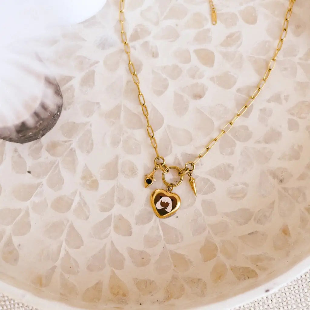 spy x family gold necklace featuring anya, loid and yor forger