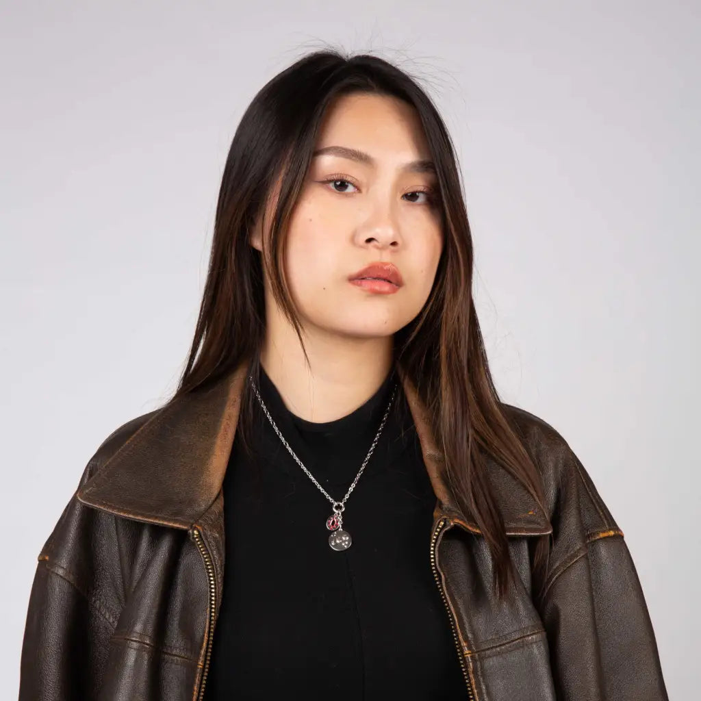 model wearing tengen uzui flashy necklace in silver